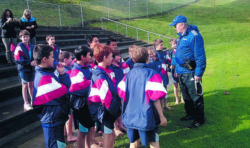 Sir Graham Henry keeps an eye out for upcoming rugby talent at the Blues training day.