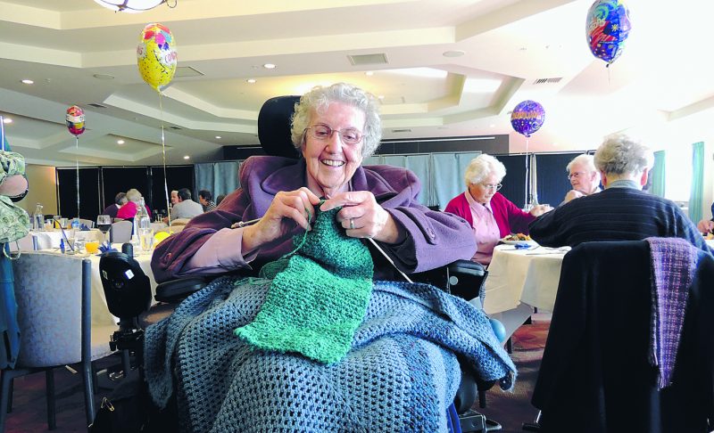 Sr Enid Lagan, RSM, knits to help children in need.