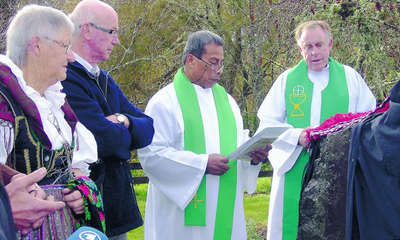 From left, Christine Krippner, Brendan Schollum (chairman of the Puhoi 150th anniversary committee), parish priest Fr Arobati Rikare and Fr Sean O'Connor at a memorial ceremony at the pioneers' landing place.