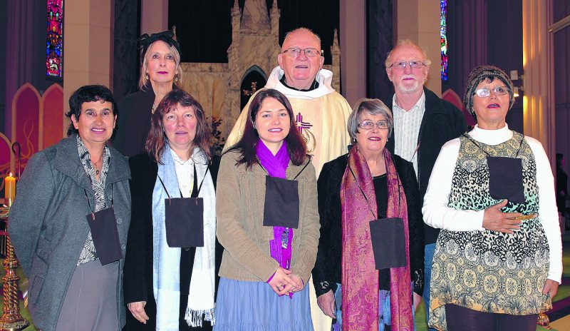 At rear: Julia de Fresne Kynoch, Fr James Des Lauriers, Mike Hogan. Front, Pha-Raine Hickman, Annette Petersen, Shayla Rodrigues, Gwenda Gopperth and Frances Wilson.