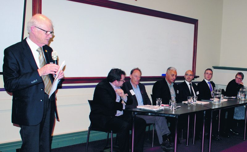 Norman Elliott introduces politicians at the Auckland diocese Justice and Peace Commission's political panel.