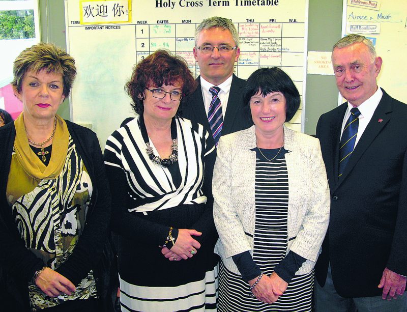 Kathy Moy-Low, second from left, and Brian Henoghan, far right, former Holy Cross principal, with three principals mentored by Mrs Low: From left, Rosemary Kemp, Our Lady of the Sacred Heart, Epsom; Paul Coakley, St Pius, Glen Innes; Ann McKeown, St Joseph’s, Orakei.