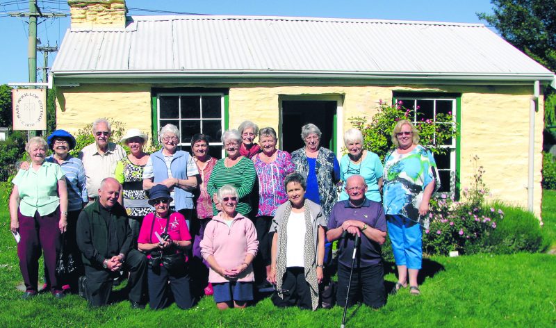 The Road Retreat group outside the cob cottage of St Mary of the Cross MacKillop in Arrowtown.