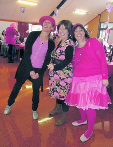 Three St Mary’s, Wanganui, parishioners who inspired “Pink Sunday”. From left, Adelie Reitsma-Reid, Claire Isted and Liza Mancer, who all welcomed the happy diversion from their cancer treatments. (Marcia O’Connor photo)