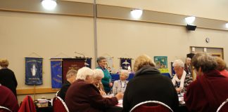Sr John Bosco Kendall, RSJ (in green top) discusses the possibility of women deacons in CWL national conference.
