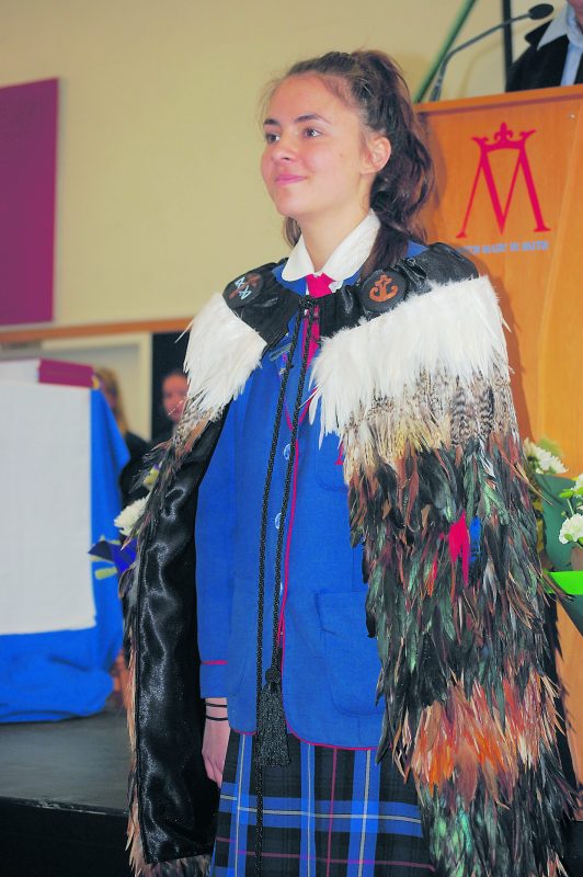 Maia Rewha wearing the korowai.