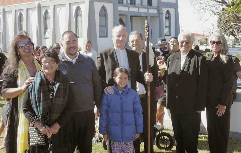 From second left to right, kui Raana Mareikura, Deacon Danny Karatea-Goddard, Bishop Charles Drennan, Fr Brian Carmine and Fr Tipene Hancy with members of the Tira Hoe Waka and Whanganui iwi.