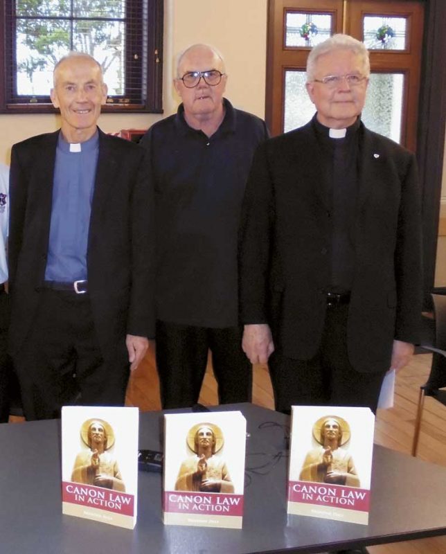 At the book launch were (from left)
Msgr Brendan Daly, Msgr David Price
and Fr Justin Taylor, SM.
