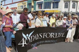 Auckland participants  pray during the last hour of the 40 Days for Life prayer rally on Dominion Road.