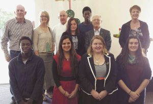 From top left: Paul and Linda Darbyshire, Fr Chris Martin, Bishop Peter Cullinane and Norma Bellamy with some of the young people that the recipients have mentored over the years.