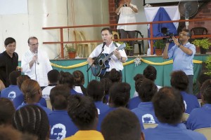 Salesians rector major Fr Angel Fernandez  Artime plays the guitar at the Don Bosco Institute at Henderson in the Solomon Islands. Fr Václav Klement is second from the left.