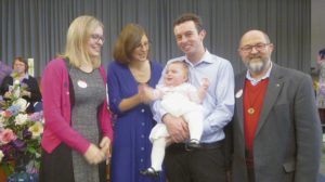 Newly baptised Tessa Grace with her parents Maurice and Natalie Atkinson (centre) and godparents Elisabeth Perham and Br Kevin Dobbyn.