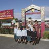 From left: Pupils Ara Toki, Tyra Jane Mazel, Chloe Lago, Fittler Smith, Algisha Aziz, Leana Fraider, Brieana Davidson, Kirkland Bennett, Kale Uili with acting principal Lydia Victor.