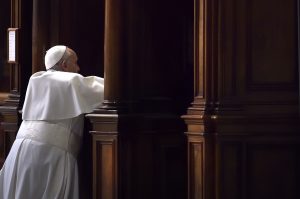 Pope Francis goes to confession during a Lenten penance service in St. Peter's Basilica at the Vatican March 13. During the service the pope announced an extraordinary jubilee, a Holy Year of Mercy, to be celebrated from Dec. 8, 2015, until Nov. 20, 2016. (CNS photo/Stefano Spaziani, pool) 