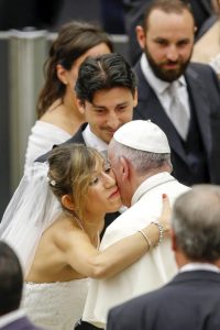 Pope Francis greets newly married couples during his weekly audience in Paul VI hall at the Vatican City