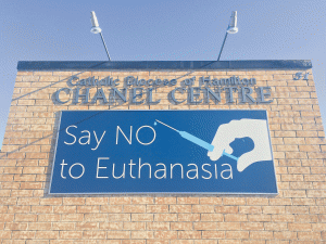 The banner outside the Chanel Centre prior to its disappearance, right.