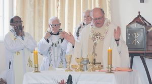 PT CHEVALIER, AUCKLAND: Fr John Webb at his 40th anniversary Mass, assisted by Frs  Matthew Vadakkevettuvazhiyil, Matthew Clerkin, OFM Cap, and Deacon Dave Marshall.