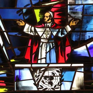 Pope Paul VI's address to the U.N. General Assembly in New York City in 1965 is depicted in a stained-glass window at the Immaculate Conception Center in Douglaston, N.Y. Oct. 4 will mark the 50th anniversary of the historic speech. Pope Francis will address the General Assembly Sept. 25. (CNS photo/Gregory A. Shemitz) See PAPALTRIP-UN-ADDRESS Sept. 14, 2015.