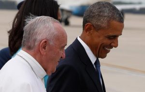 Pope Francis walks with U.S. President Barack Obama on the airfield at Joint Base Andrews in Maryland Sept. 22. (CNS photo/Paul Haring) See POPE-US-ARRIVE Sept. 22, 2015.