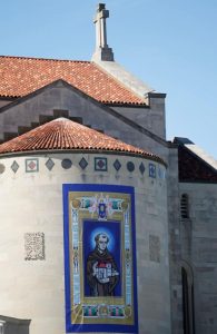 A banner displays an image of Blessed Junipero Serra at the Basilica of the National Shrine of the Immaculate Conception in Washington Sept. 23 just ahead of his canonization by Pope Francis. (CNS photo/Bob Roller) See POPE-SERRA-MASS Sept. 23, 2015.