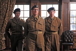 From left: Caleb Landry Jones, David Thewliss and Callum Turner in a scene from Queen and Country.