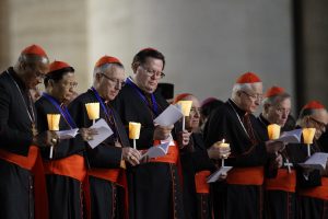 Wellington Cardinal John Dew (third from left) attends a prayer vigil for the Synod of Bishops on the family in St. Peter's Square at the Vatican Oct. 3. (CNS/Paul Haring) See POPE-SYNOD-MASS Oct. 4, 2015.