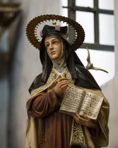 A statue of St. Teresa of Avila, Spanish mystic and doctor of the church, stands in the sanctuary of the Serra Chapel at Mission San Juan Capistrano in San Juan Capistrano, Calif. God's love is expansive, boundless and limitless, Pope Francis said while celebrating Mass on the feast of St. Teresa of Avila. (CNS photo/Nancy Wiechec) See POPE-SALVATION-MERCY Oct. 15, 2015.
