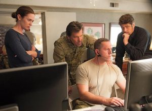 Emily Blunt, Josh Brolin and Benicio Del Toro star in a scene from the movie "Sicario." The Catholic News Service classification is O -- morally offensive. The Motion Picture Association of America rating is R -- restricted. Under 17 requires accompanying parent or adult guardian.(CNS photo/Lionsgate) See MOVIE-REVIEW-SICARIO Oct. 2, 2015.