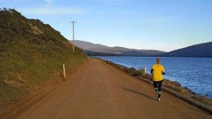 One of the Australian women clocks up the k's on the road to Bluff.