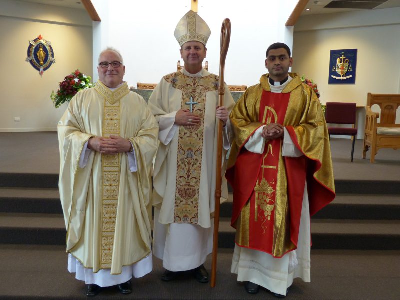Fr Joseph George, right, with Fr Stuart Young and Bishop Steve Lowe after the bishop had ordained the two men on October 10.