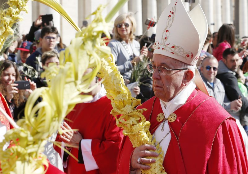 Pope Francis carries palm fronds in procession during Palm Sunday Mass in St. Peter's Square at the Vatican March 20. (CNS photo/Paul Haring) See POPE-PALM-SUNDAY March 20, 2016.