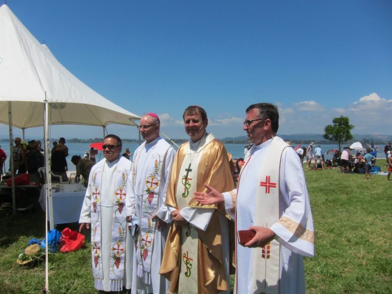 From left, Fr Edwin Macmac, Bishop Charles Drennan, Bishop Steve Lowe and St Thomas Aquinas parish priest Fr Mark Field at Motuhoa Island, Bay of Plenty.