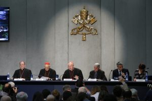 Austrian Cardinal Christoph Schonborn speaks during a news conference for the release of Pope Francis' apostolic exhortation on the family, "Amoris Laetitia" ("The Joy of Love"), at the Vatican April 8. From left are: Bishop Fabio Fabene, undersecretary of the Synod of Bishops; Cardinal Lorenzo Baldisseri, general secretary of the synod; Cardinal Schonborn; Jesuit Father Federico Lombardi, papal spokesman; and Pina De Simone and Francesco Miano, a married couple who participated in the Synod of Bishops on the family. (CNS photo/Paul Haring) See POPE-FAMILY-EXHORTATION and VATICAN-LETTER-FAMILY April 8, 2016.