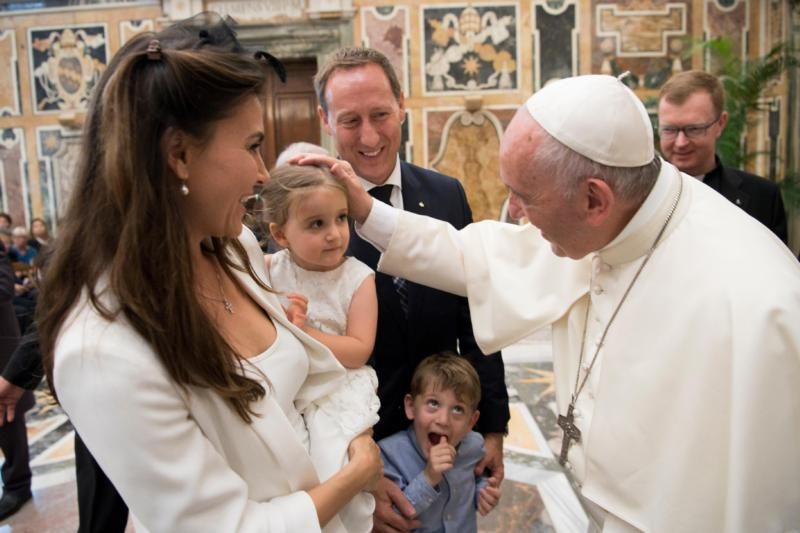 Pope Francis greets family members during an audience with participants in an international congress on protecting children in a digital world, at the Vatican Oct. 6. The pope pledged "to work strenuously and with foresight for the protection of minors and their dignity." (CNS photo/L'Osservatore Romano) See POPE-DIGITAL-ABUSE Oct. 6, 2017.