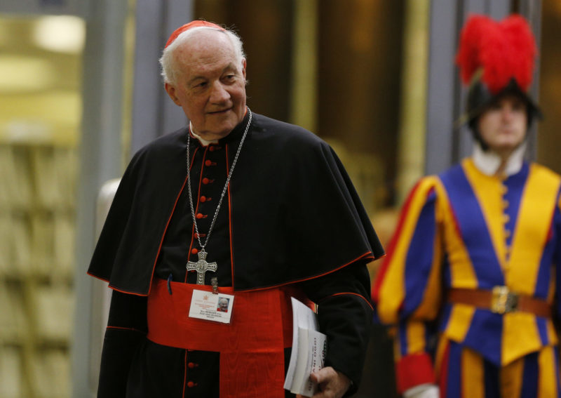 Cardinal Marc Ouellet, prefect of the Congregation for Bishops, leaves the opening session of the Synod of Bishops on young people, the faith and vocational discernment at the Vatican Oct 3. In an Oct. 7 open letter, Cardinal Ouellet said the Congregation for Bishops had placed restrictions on former Cardinal Theodore E. McCarrick, but Pope Benedict XVI had not applied formal sanctions. (CNS photo/Paul Haring) See VATICAN-LETTER-MCCARRICK Oct. 8, 2018 and OULLET-VIGANO-MCCARRICK Oct. 7, 2018