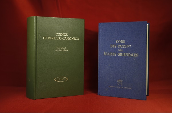 Code of Canon Law books for the Latin and Eastern Catholic churches are pictured in Rome at the Pontifical Oriental Institute Sept. 15. Pope Francis ordered changes to the Latin Code of Canon Law to harmonize the laws of the Latin and Eastern Catholic churches on several issues involving the sacraments of baptism and marriage. (CNS photo/Paul Haring) See POPE-LATIN-EASTERN-CANONS Sept. 15, 2016.