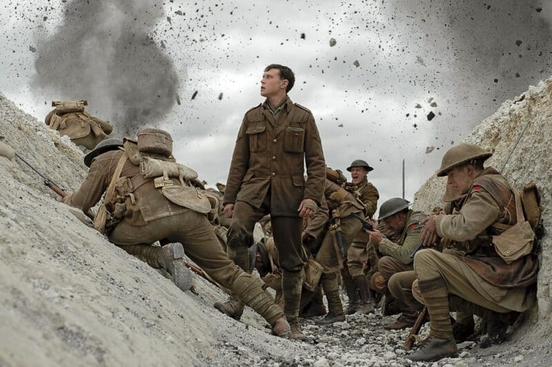 George MacKay, center, stars in a scene from the movie "1917." The Catholic News Service classification is A-III -- adults. The Motion Picture Association rating is R -- restricted. Under 17 requires accompanying parent or adult guardian. (CNS photo/Universal) See MOVIE-REVIEW-1917 Jan. 9, 2020.