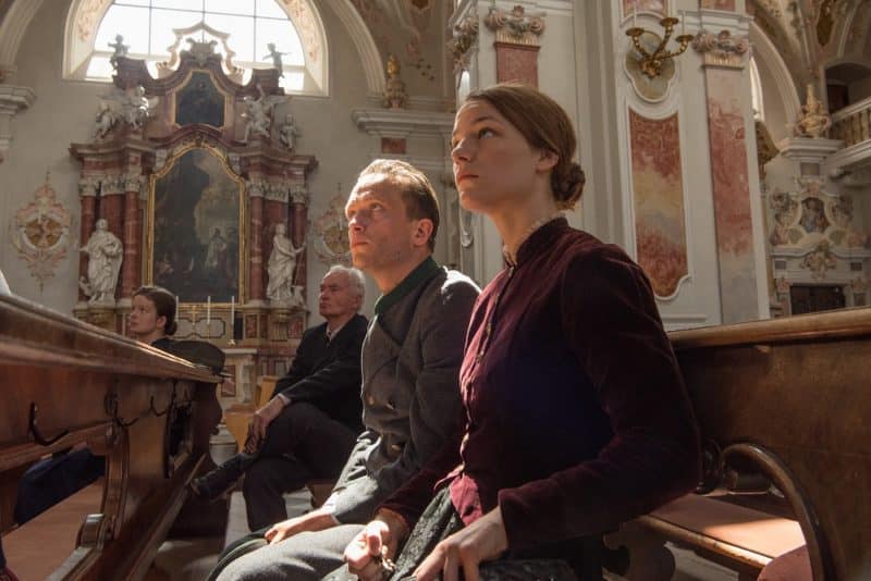 August Diehl and Valerie Pachner star in a scene from the movie "A Hidden Life." The Catholic News Service classification is A-II -- adults and adolescents. The Motion Picture Association rating is PG-13 -- parents strongly cautioned. Some material may be inappropriate for children under 13. (CNS photo/Fox) See MOVIE-REVIEW-HIDDEN-LIFE Dec. 17, 2019.