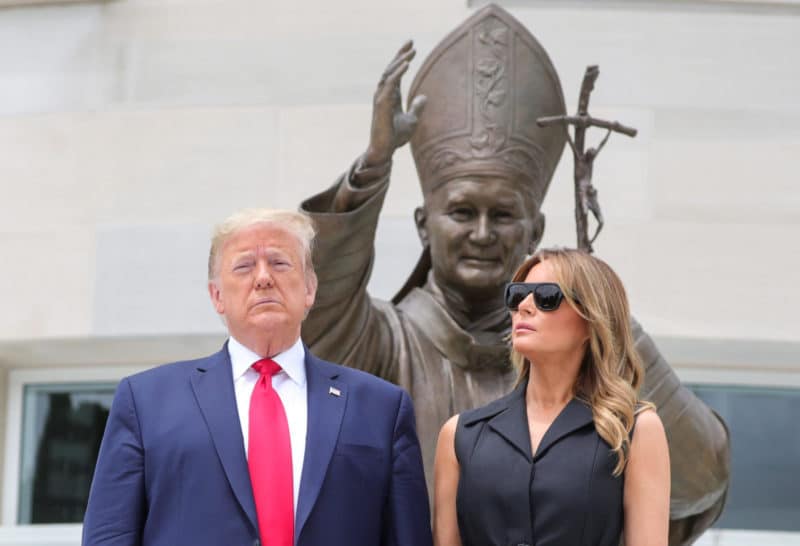 U.S. President Donald Trump and first lady Melania Trump pose outside the St. John Paul II National Shrine in Washington June 2, 2020, the 41st anniversary of beginning of pope's 1979 historic visit to Poland. (CNS photo/Tom Brenner, Reuters) See TRUMP-JPII-SHRINE June 2, 2020.