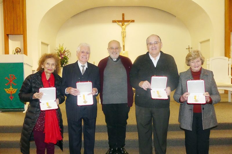 (From left) Daphne Thorose, Ron Healing, Fr Rick Loughnan, Pat McQuinn and Pat Carroll. 