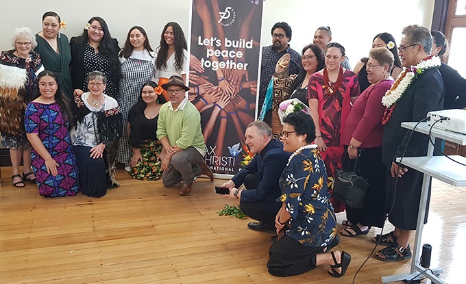 The Pacific Climate Warriors, family and friends gather with Bishop Michael Gielen after receiving the award at the  St Columba Centre - Te Tutaki, Ponsonby (Image: Del Abcede/Asia Pacific Report) 