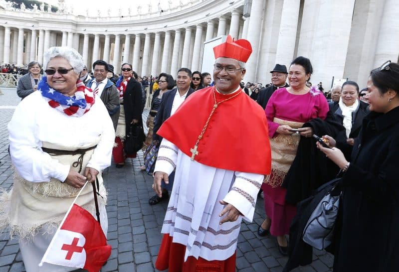 New Cardinal Soane Mafi of Tonga greets pilgrims from his country after a consistory at which he was made a cardinal by Pope Francis in St. Peter's Basilica at the Vatican Feb. 14. (CNS photo/Paul Haring) See POPE-CARDINALS Feb. 14, 2015.