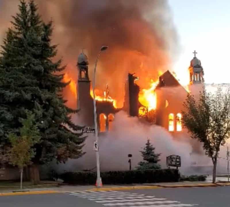 Flames engulf St. Jean Baptiste Church in Morinville, Alberta, June 30, 2021, in this still image taken form video obtained from social media. The early morning fire destroyed the century-old Catholic church near Edmonton and is being treated as suspicious by Royal Canadian Mounted Police. (CNS photo/Diane Burrel, social media via Reuters) EDITORS: THIS IMAGE HAS BEEN SUPPLIED BY A THIRD PARTY. MANDATORY CREDIT. NO RESALES. NO ARCHIVES.