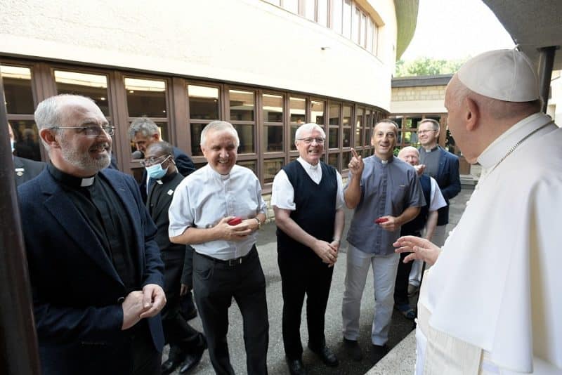 Pope Francis talks with members of the Society of Jesus at the apostolic nunciature in Bratislava, Slovakia, Sept. 12, 2021. During a private meeting, the pope spoke to the Jesuits about his health, the pastoral work of Jesuits in Slovakia, and how he deals with suspicions or criticisms. (CNS photo/Vatican Media)
