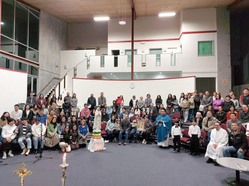 Fr Nathaniel Tat Brazil with some of the members of the St John Paul II Catholic Community, Albany, before lockdown