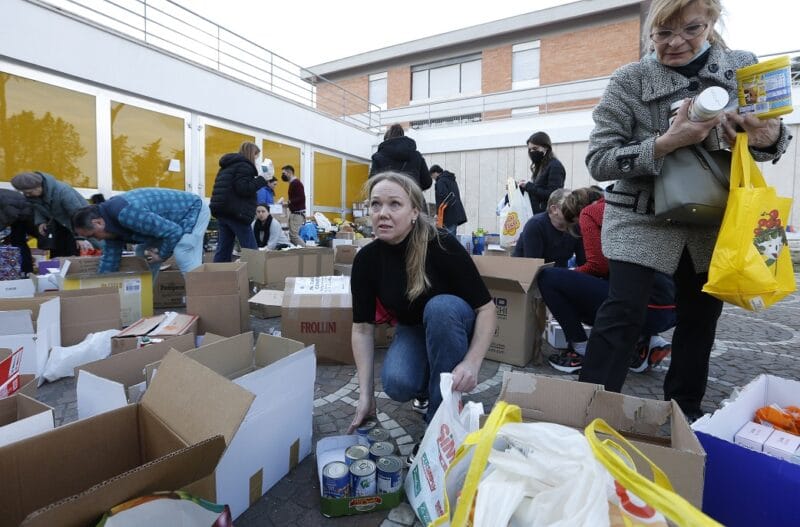 People prepare food to be sent to Ukraine at the Basilica of St. Sophia, the church of the Ukrainians in Rome, March 7, 2022. (CNS photo/Paul Haring)