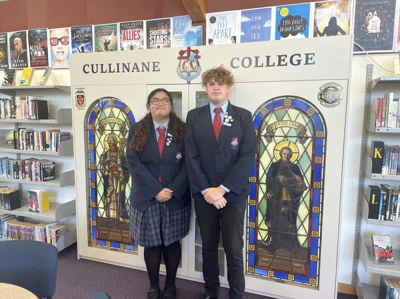 Cullinane College’s head girl Faith Solomona and head boy Nathaniel Daley with the 
two stained glass windows