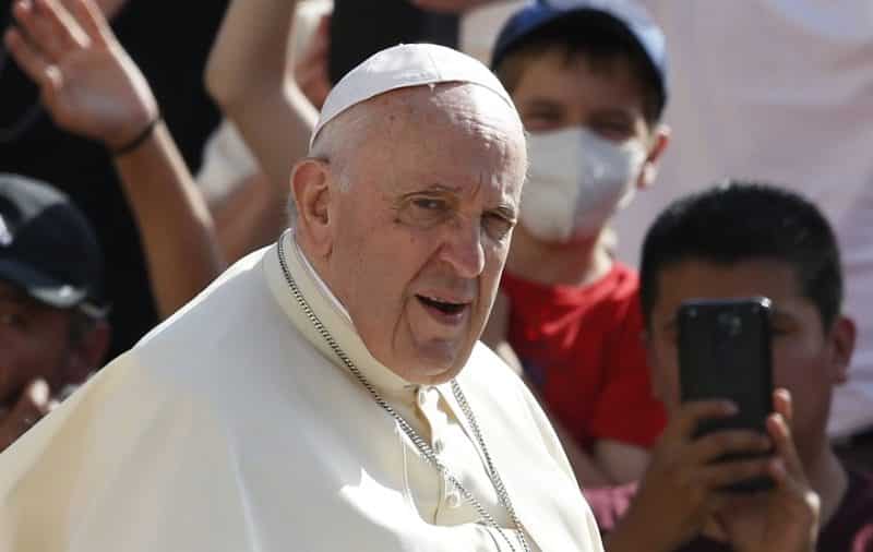 Pope Francis is pictured while greeting the crowd during his general audience in St. Peter's Square at the Vatican May 25, 2022. (CNS photo/Paul Haring)