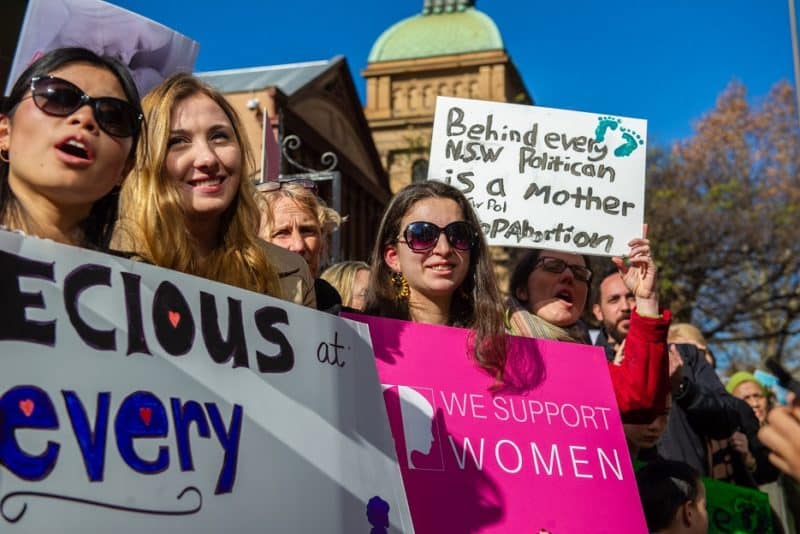 Pro-life supporters gather while holding signs outside the New South Wales Parliament House in Sydney Aug. 1, 2019. Archbishop Anthony Fisher of Sydney described as "very encouraging" the leaked U.S. Supreme Court draft majority opinion that said "Roe was egregiously wrong from the start."(CNS photo/Giovanni Portelli, courtesy Right To Life NSW)