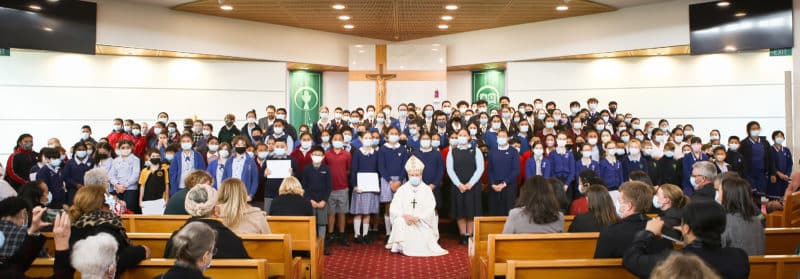 Bishop Stephen Lowe with school volunteers acknowledged at the Caring Mass (Photo: Joey Bonnevie, Youth and Young Adult Ministry, Catholic Diocese of Auckland) 
